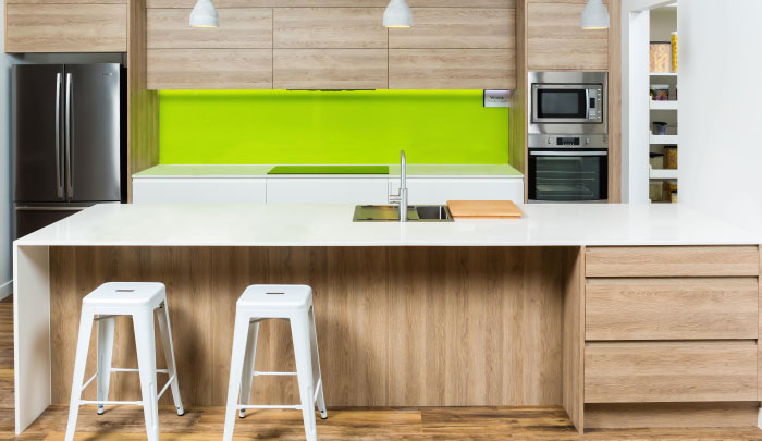 Timber kitchen with green splash back